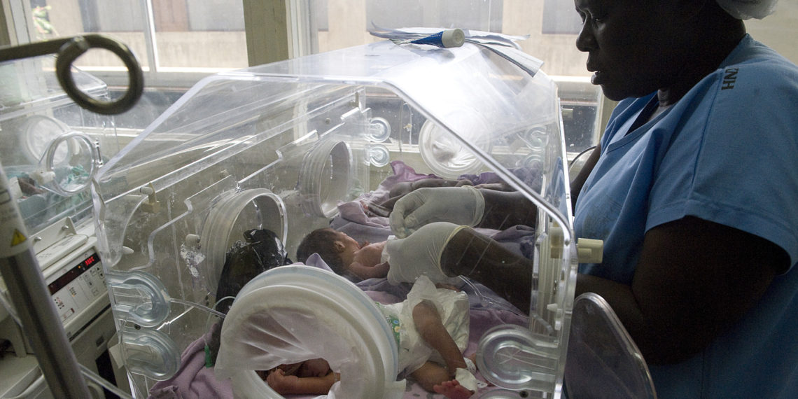 A picture taken on December 19, 2013 at a hospital in Nairobi shows a Kenyan nurse attending to four newly born babies squeezed in an incubator due to doctors and nurses strike. Kenya health workers went on strike on December 10 protesting the government decision to devolve services, including their pay, to 47 counties.The strike has entered its ninth day, paralyzing operations in all public hospitals and health centers in the East African nation.AFP PHOTO/SIMON MAINA        (Photo credit should read SIMON MAINA/AFP/Getty Images)