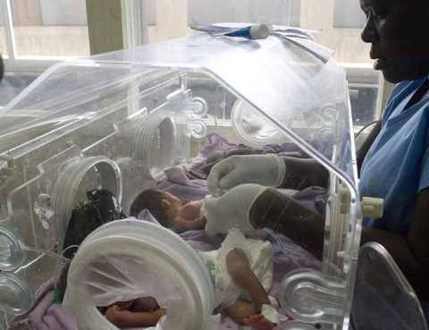 A picture taken on December 19, 2013 at a hospital in Nairobi shows a Kenyan nurse attending to four newly born babies squeezed in an incubator due to doctors and nurses strike. Kenya health workers went on strike on December 10 protesting the government decision to devolve services, including their pay, to 47 counties.The strike has entered its ninth day, paralyzing operations in all public hospitals and health centers in the East African nation.AFP PHOTO/SIMON MAINA        (Photo credit should read SIMON MAINA/AFP/Getty Images)